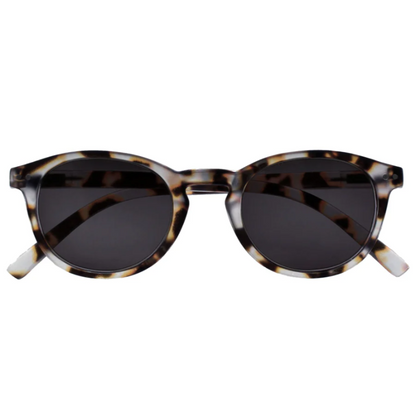 Sunglasses with tortoiseshell frame and dark lenses on a white background