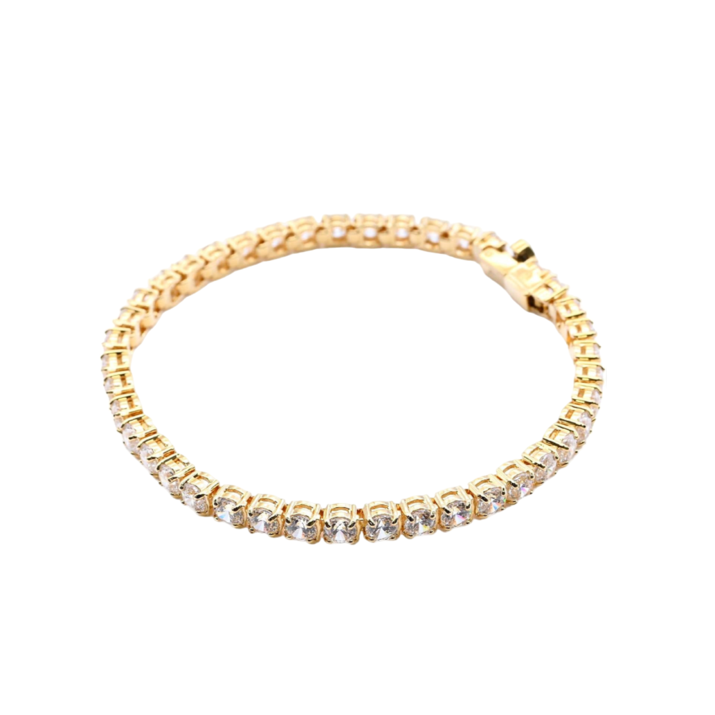 Gold bracelet with crystals on a white background