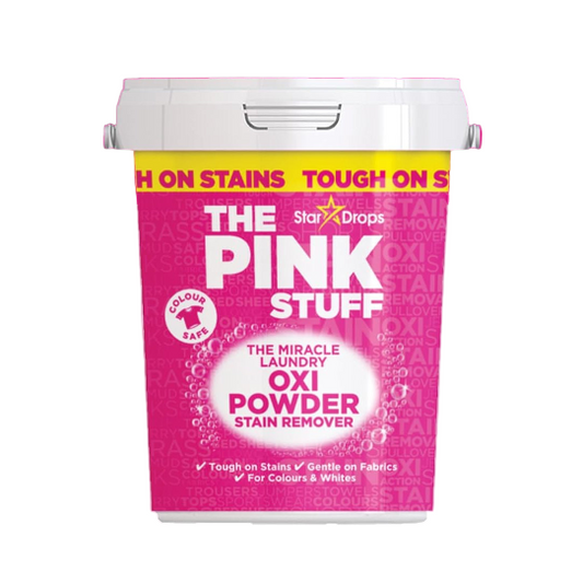 Pink container of 'The Pink Stuff' laundry oxi powder stain remover with branding on a white background.