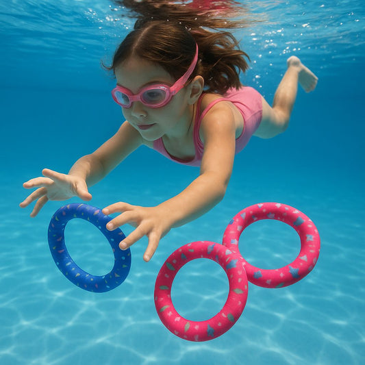 Child swimming underwater with pink and blue rings in clear blue water