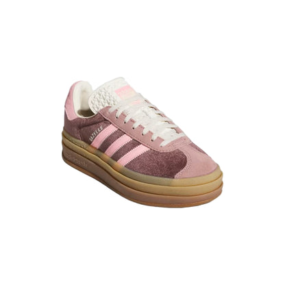 Pink and brown Adidas sneaker on a white background