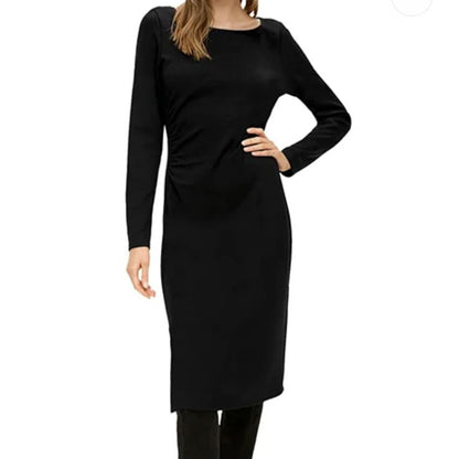 Woman wearing a black dress on a white background