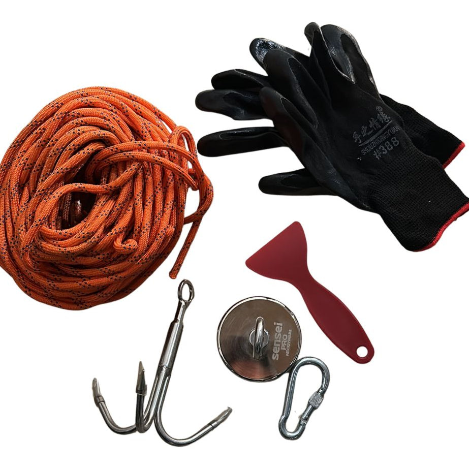 Set of climbing gear including orange rope, gloves, carabiner, hook, and a tool on a white background
