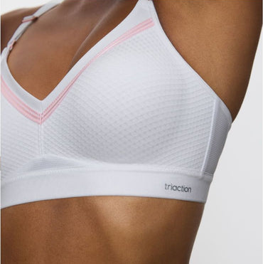 White sports bra with pink trim on a website page, featuring the brand 'sapoo'.