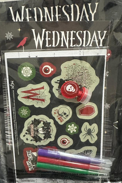 Packaged product with 'Wednesday' theme featuring stickers and markers.
