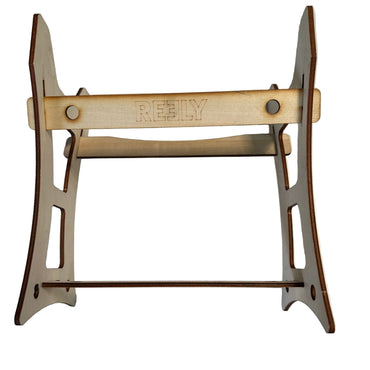 Wooden stand with 'RELY' branding on a white surface