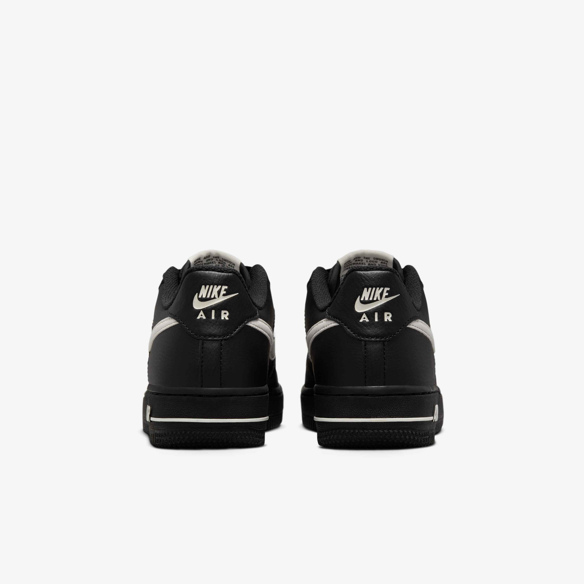 Nike Air Force 1 Older Kids' Iconic Black Leather Sneakers with Red Accents