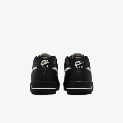 Nike Air Force 1 Older Kids' Iconic Black Leather Sneakers with Red Accents