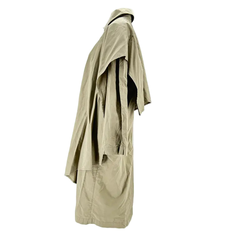 Beige trench coat on a mannequin against a white background