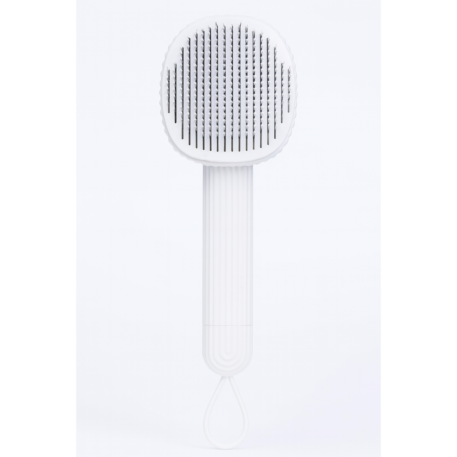 White pet brush with textured head on a white background
