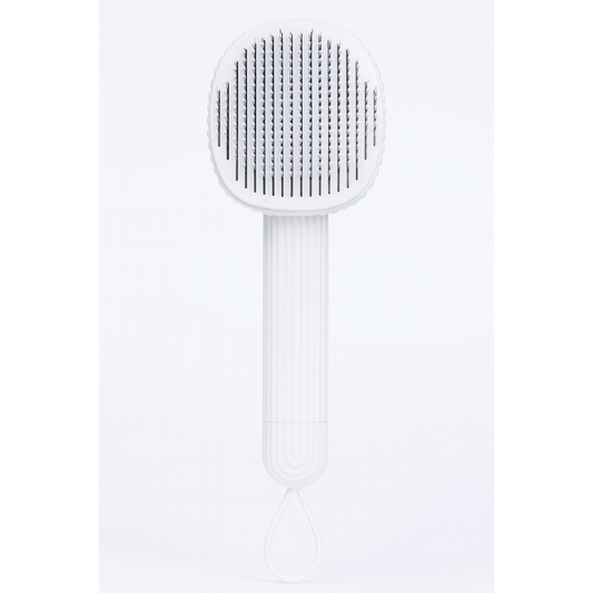 White pet brush with textured head on a white background