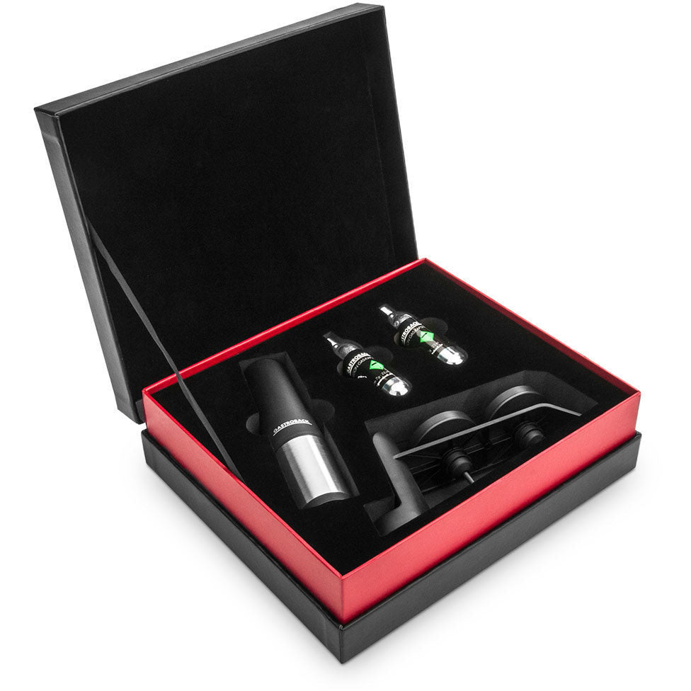 Black and red gift box containing electronic devices on a white background