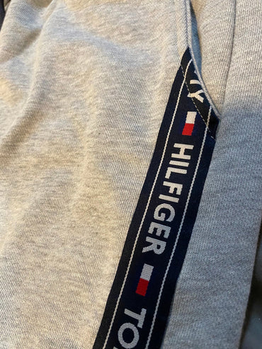 Tommy Hilfiger logo on a gray garment