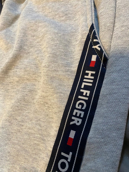 Tommy Hilfiger logo on a gray garment