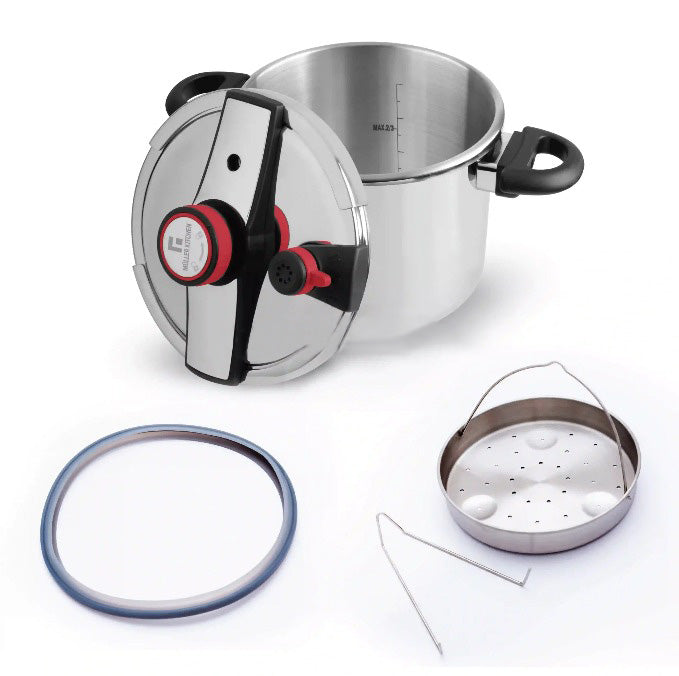Stainless steel pressure cooker with components on a white background