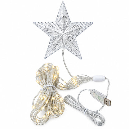 A clear plastic star-shaped Christmas tree topper with attached white wired LED lights and a USB charging cable, laid out on a white fabric background.