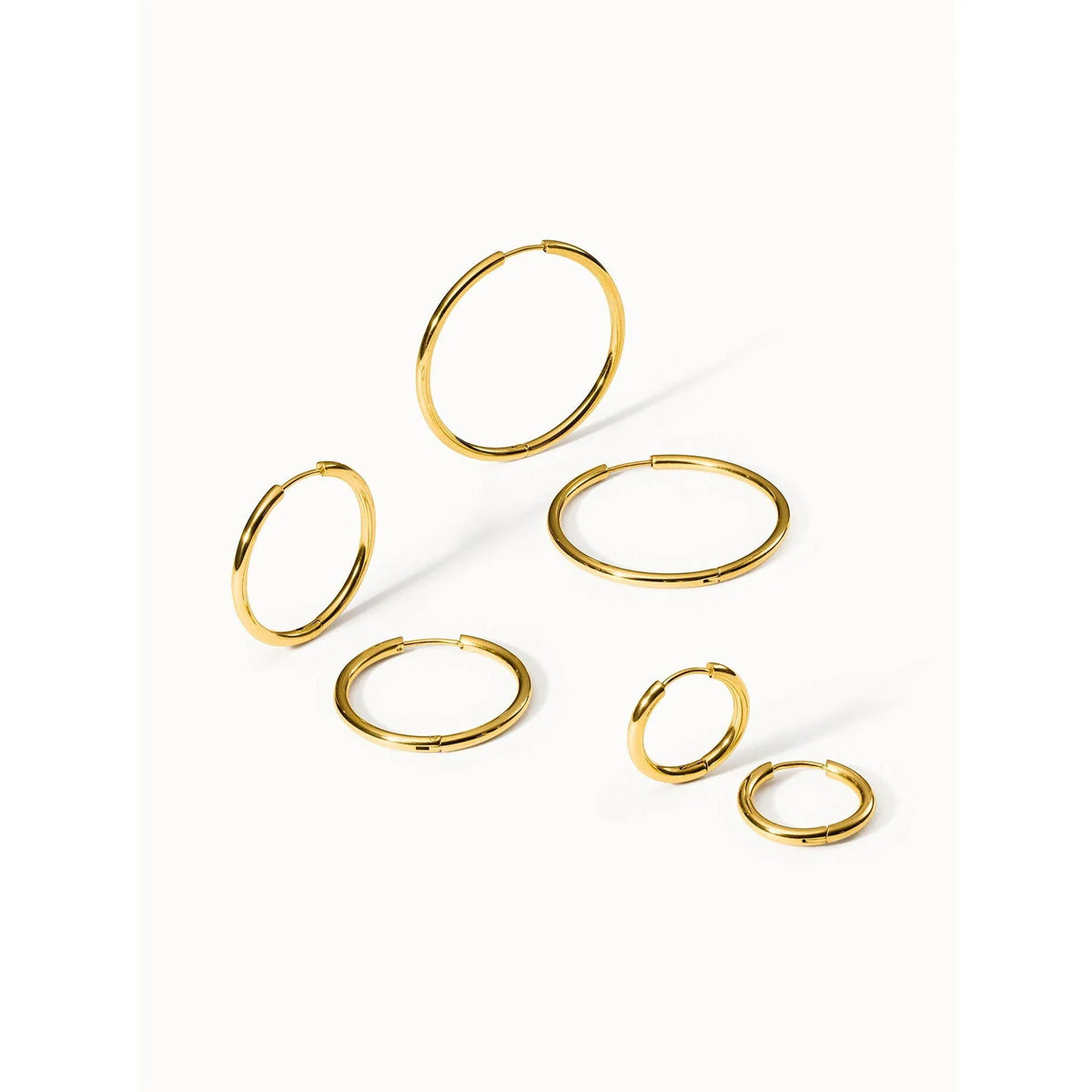 Elegant Echo Earring Set: Waterproof Stainless Steel Hoops & Studs - Gomix Brands Outlet