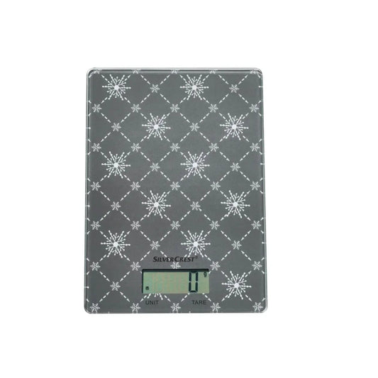 Digital kitchen scale with snowflake pattern on a white background