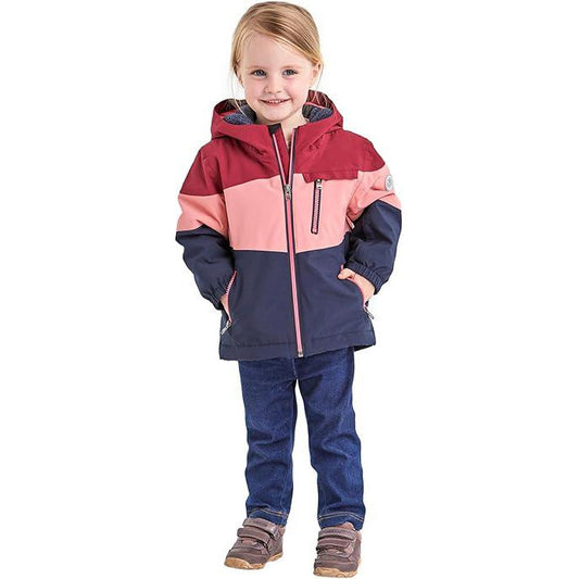 Child wearing a colorful jacket and pants on a white background