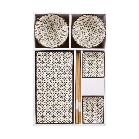Set of patterned bowls and chopsticks in a box